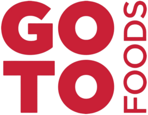 Large red text on a transparent background reads “GO TO FOODS,” with “GO TO” stacked vertically and “FOODS” written vertically along the right side, giving a bold, no-code inspired look.