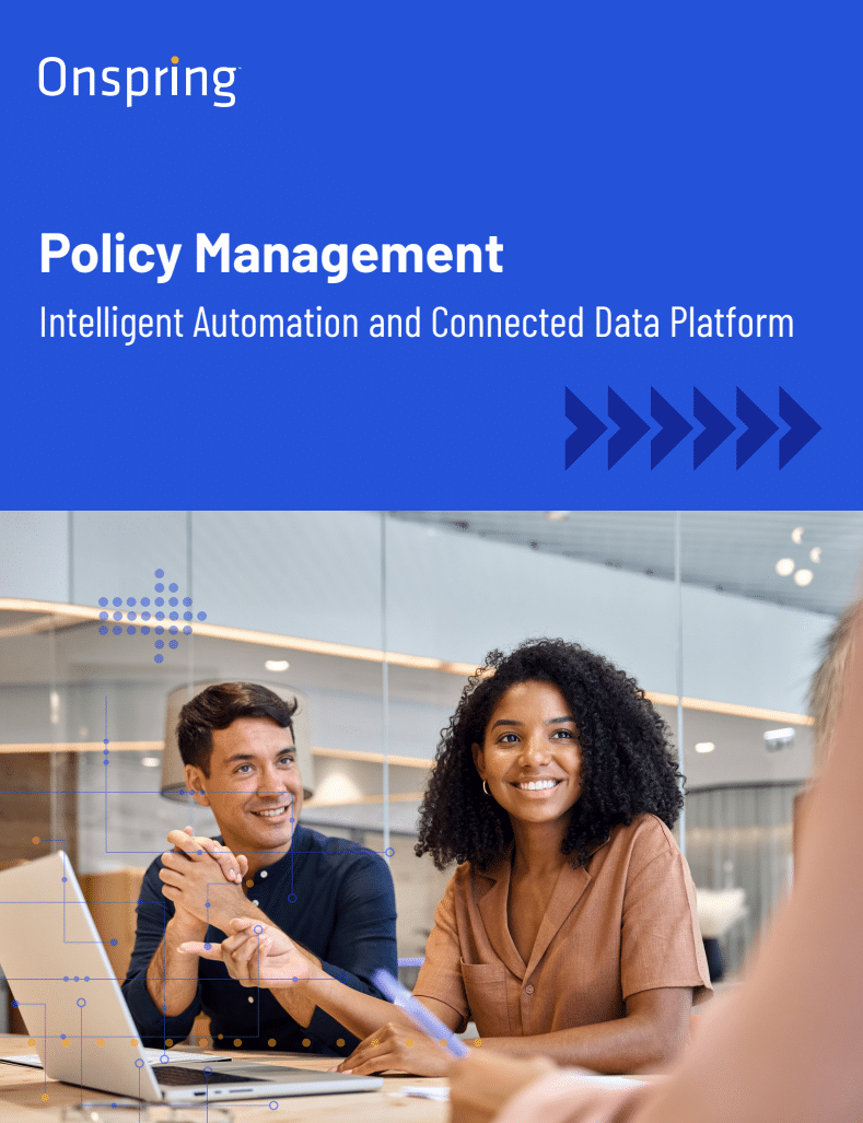 Two professionals sit at a desk with a laptop, smiling and engaged in discussion. The image is part of a cover for Policy Management: Intelligent Automation and Connected Data Platform by Onspring, highlighting effective policy management solutions.