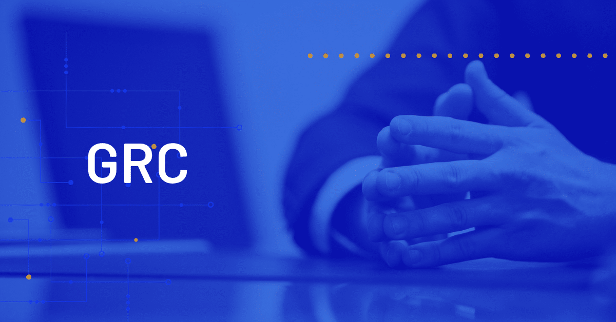 A persons hands rest on a table next to a blurred laptop. The word GRC appears in bold white letters on a blue background with faint geometric lines and yellow dots.